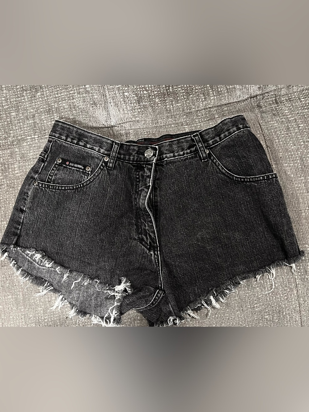 vintage 1990s B.U.M. Equipment black denim cutoff shorts. Q16